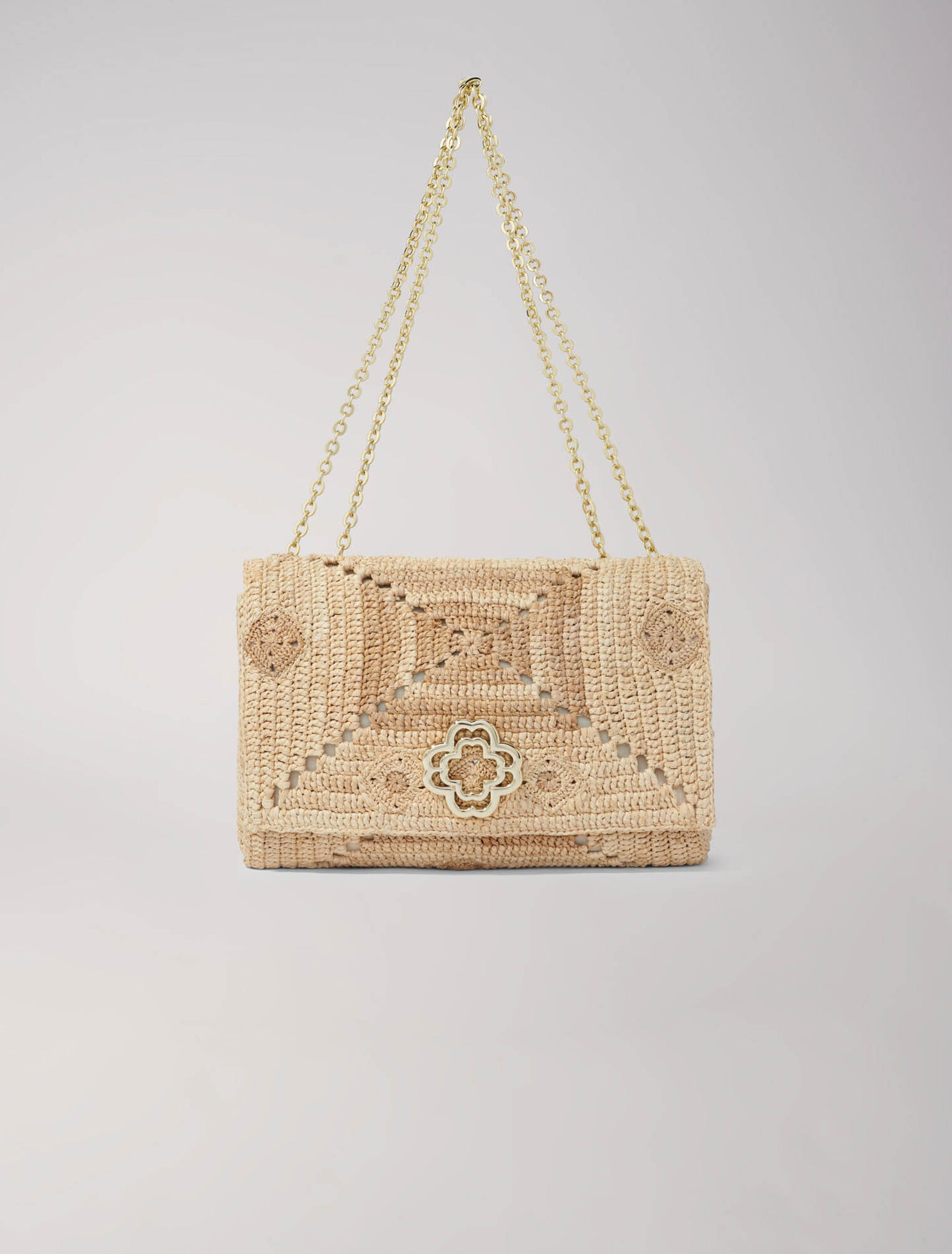 Bolso clover de rafia hecho a mano