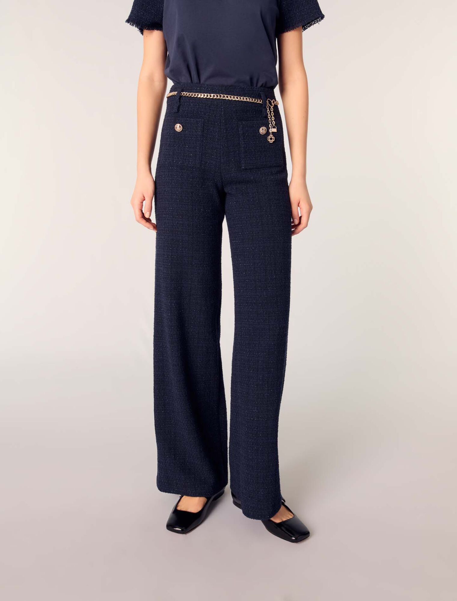 Pantalón tweed con cinturón cadena