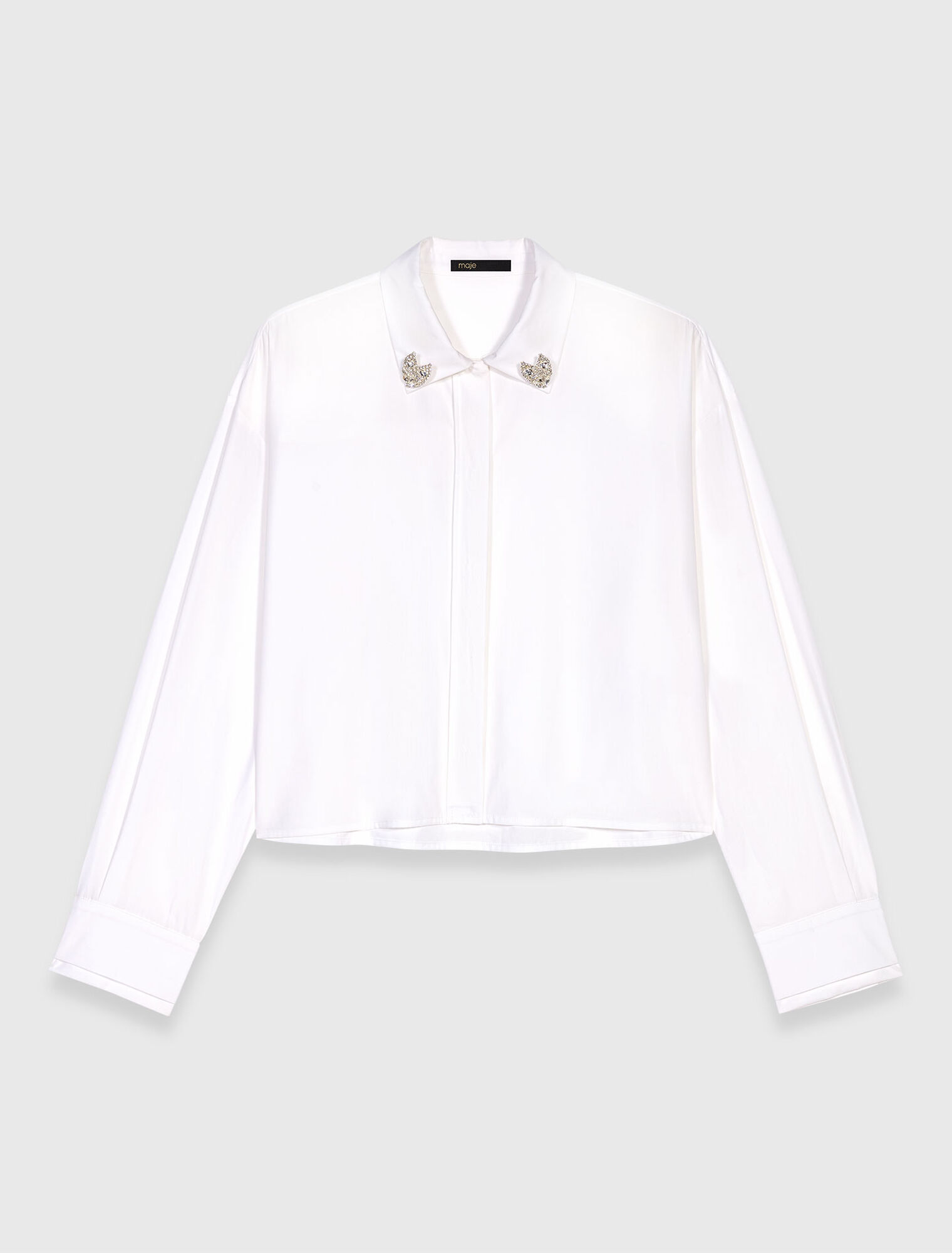 Camisa corta con detalles joya