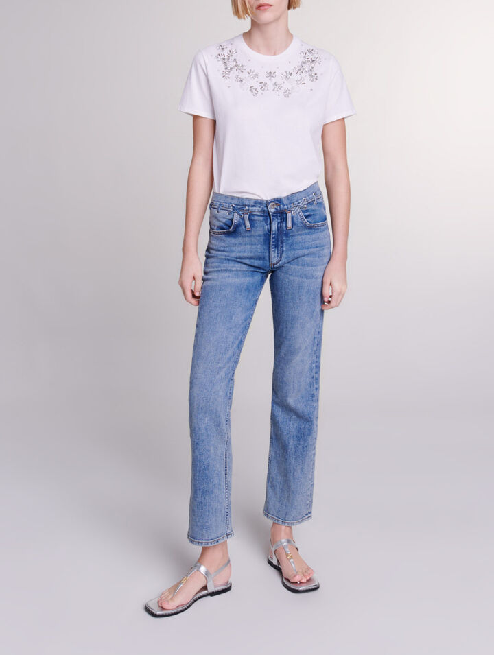 Vaquero con detalles trenzados