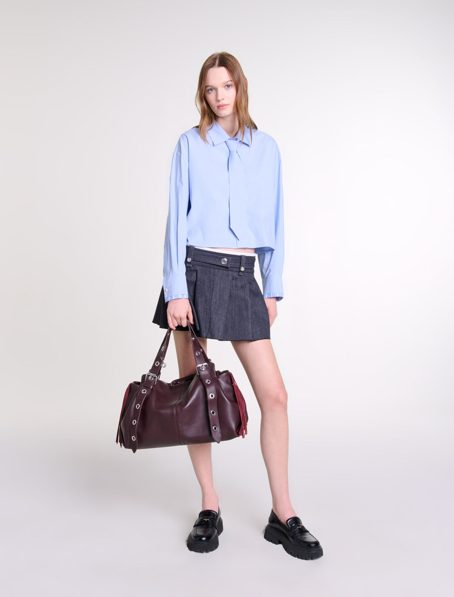 Minifalda negra efecto denim