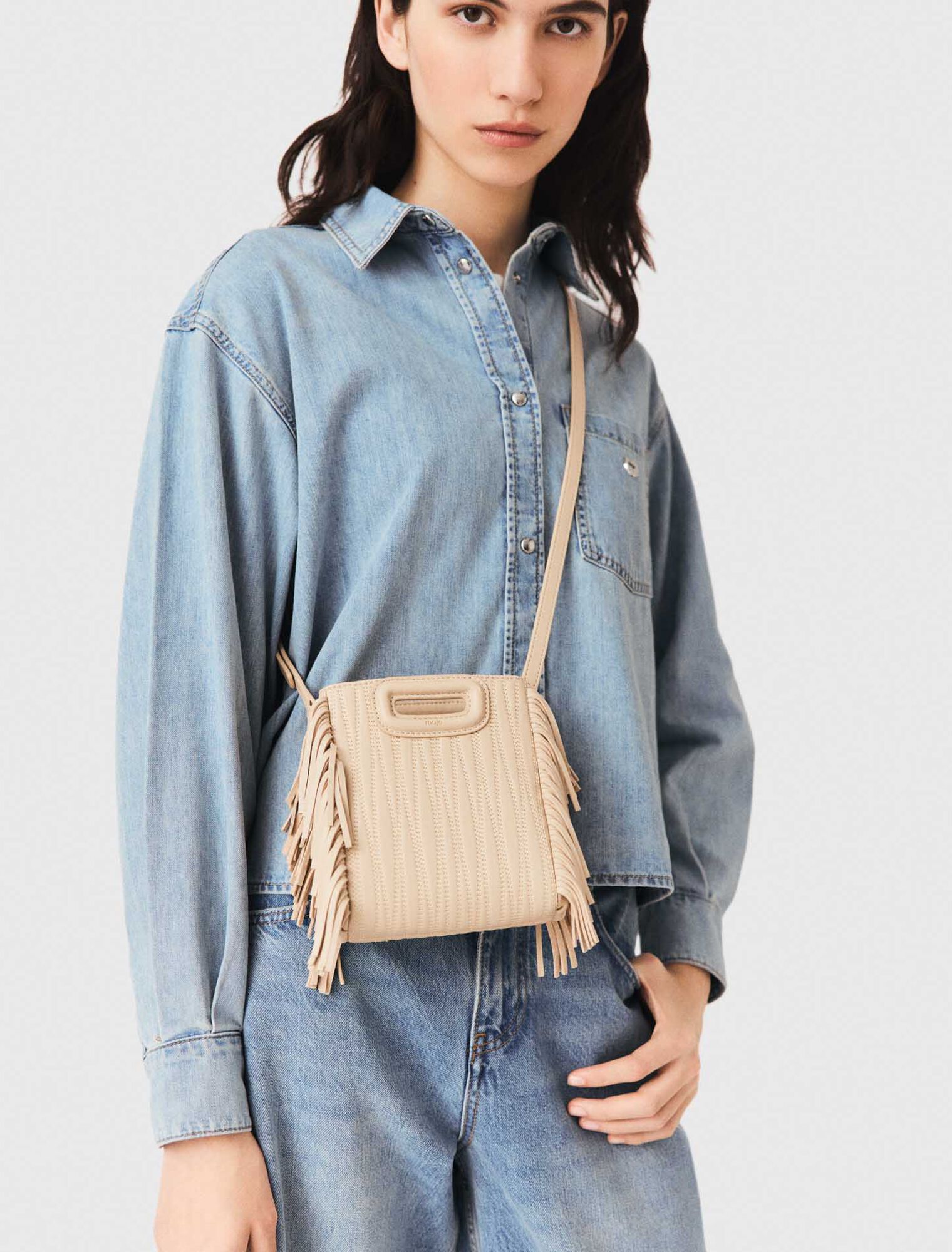 Bolso M mini de cuero pespunteado