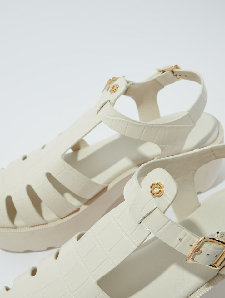 Sandalias de suela dentada en piel